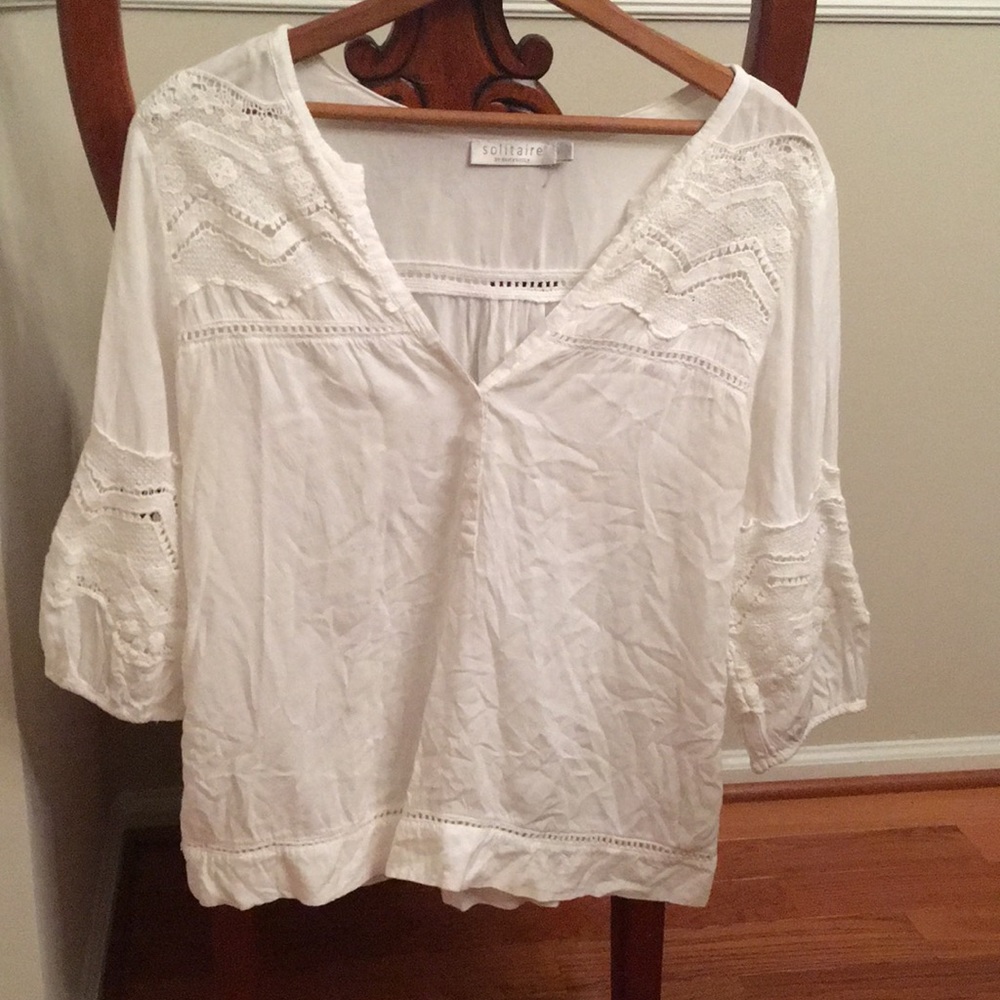 White blouse with details and buttons
